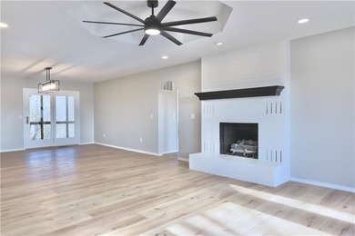 This completely remodeled 3-bedroom, 2-bath home offers modern on Bella Vista Country Club and Golf Course in Arkansas - for sale on GolfHomes.com, golf home, golf lot