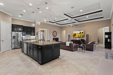 Immaculate custom-built lakefront home in the gated Copperleaf on Evergreen Club in Florida - for sale on GolfHomes.com, golf home, golf lot