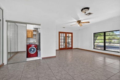 Stunning 4BR/2BA waterfront pool home in prestigious Country on Country Club of Miami in Florida - for sale on GolfHomes.com, golf home, golf lot