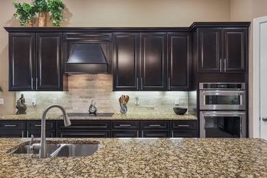 Immaculate custom-built lakefront home in the gated Copperleaf on Evergreen Club in Florida - for sale on GolfHomes.com, golf home, golf lot