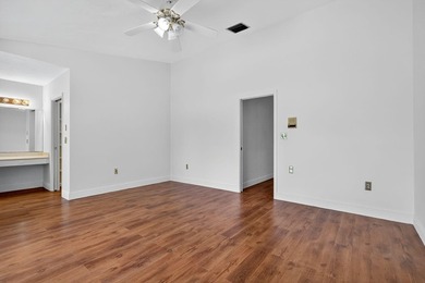 Stunning 4BR/2BA waterfront pool home in prestigious Country on  in Florida - for sale on GolfHomes.com, golf home, golf lot