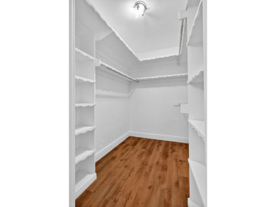 Stunning 4BR/2BA waterfront pool home in prestigious Country on Country Club of Miami in Florida - for sale on GolfHomes.com, golf home, golf lot