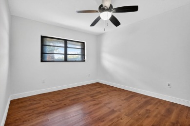 Stunning 4BR/2BA waterfront pool home in prestigious Country on Country Club of Miami in Florida - for sale on GolfHomes.com, golf home, golf lot