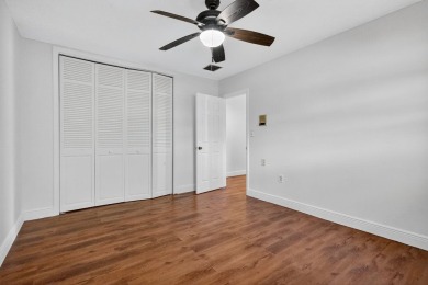 Stunning 4BR/2BA waterfront pool home in prestigious Country on Country Club of Miami in Florida - for sale on GolfHomes.com, golf home, golf lot