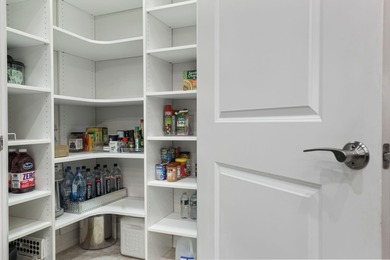 Immaculate custom-built lakefront home in the gated Copperleaf on Evergreen Club in Florida - for sale on GolfHomes.com, golf home, golf lot