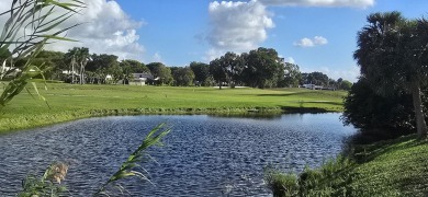 Stunning 4BR/2BA waterfront pool home in prestigious Country on Country Club of Miami in Florida - for sale on GolfHomes.com, golf home, golf lot
