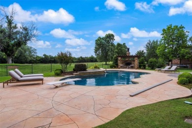 Nestled in the prestigious Oak Tree community.  Well designed on Oak Tree National Golf and Country Club in Oklahoma - for sale on GolfHomes.com, golf home, golf lot