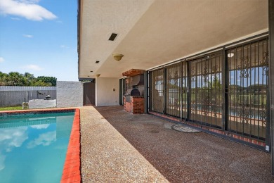 Stunning 4BR/2BA waterfront pool home in prestigious Country on Country Club of Miami in Florida - for sale on GolfHomes.com, golf home, golf lot