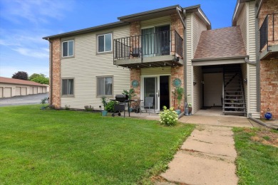 Introducing this charming first floor, end unit condo with a on BlackStone Creek Golf Club in Wisconsin - for sale on GolfHomes.com, golf home, golf lot