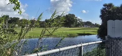 Stunning 4BR/2BA waterfront pool home in prestigious Country on Country Club of Miami in Florida - for sale on GolfHomes.com, golf home, golf lot