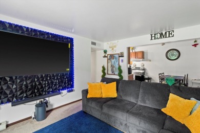 Introducing this charming first floor, end unit condo with a on BlackStone Creek Golf Club in Wisconsin - for sale on GolfHomes.com, golf home, golf lot