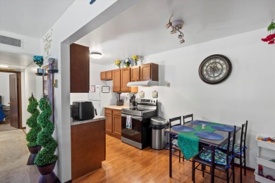Introducing this charming first floor, end unit condo with a on BlackStone Creek Golf Club in Wisconsin - for sale on GolfHomes.com, golf home, golf lot