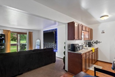 Introducing this charming first floor, end unit condo with a on BlackStone Creek Golf Club in Wisconsin - for sale on GolfHomes.com, golf home, golf lot