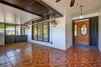 Stunning 4BR/2BA waterfront pool home in prestigious Country on Country Club of Miami in Florida - for sale on GolfHomes.com, golf home, golf lot