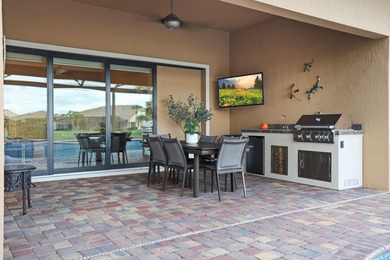 Immaculate custom-built lakefront home in the gated Copperleaf on Evergreen Club in Florida - for sale on GolfHomes.com, golf home, golf lot