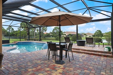 Immaculate custom-built lakefront home in the gated Copperleaf on Evergreen Club in Florida - for sale on GolfHomes.com, golf home, golf lot