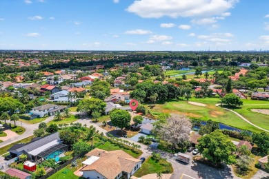 Stunning 4BR/2BA waterfront pool home in prestigious Country on Country Club of Miami in Florida - for sale on GolfHomes.com, golf home, golf lot