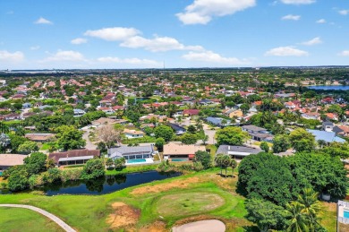 Stunning 4BR/2BA waterfront pool home in prestigious Country on Country Club of Miami in Florida - for sale on GolfHomes.com, golf home, golf lot