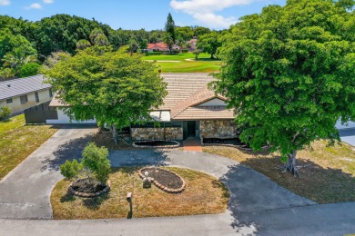 Stunning 4BR/2BA waterfront pool home in prestigious Country on Country Club of Miami in Florida - for sale on GolfHomes.com, golf home, golf lot