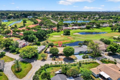 Stunning 4BR/2BA waterfront pool home in prestigious Country on Country Club of Miami in Florida - for sale on GolfHomes.com, golf home, golf lot