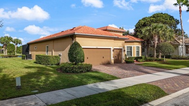 Immaculate custom-built lakefront home in the gated Copperleaf on Evergreen Club in Florida - for sale on GolfHomes.com, golf home, golf lot