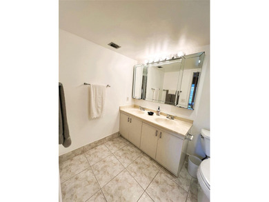 SELLER IS MOTIVATED. Imagine Sipping your Coffee Enjoying this on Wynmoor Golf Course in Florida - for sale on GolfHomes.com, golf home, golf lot