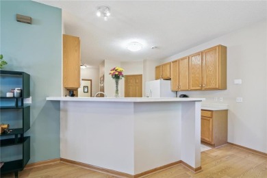 Fantastic end-unit townhome tucked into a prime Blaine location! on TPC of the Twin Cities in Minnesota - for sale on GolfHomes.com, golf home, golf lot