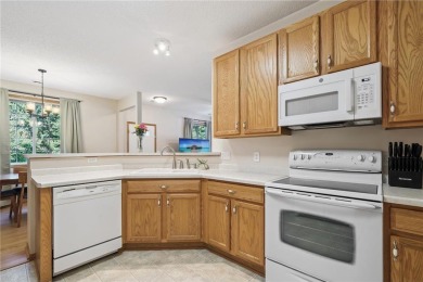 Fantastic end-unit townhome tucked into a prime Blaine location! on TPC of the Twin Cities in Minnesota - for sale on GolfHomes.com, golf home, golf lot