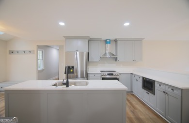 Renovations are complete! This huge home comes complete with a on Brookstone Golf and Country Club in Georgia - for sale on GolfHomes.com, golf home, golf lot