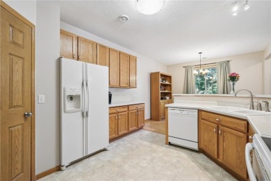 Fantastic end-unit townhome tucked into a prime Blaine location! on TPC of the Twin Cities in Minnesota - for sale on GolfHomes.com, golf home, golf lot