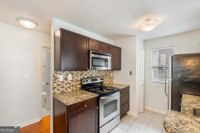 Welcome to Alpharetta condo living at its best with ZERO RENT on Rivermont Golf and Country Club in Georgia - for sale on GolfHomes.com, golf home, golf lot