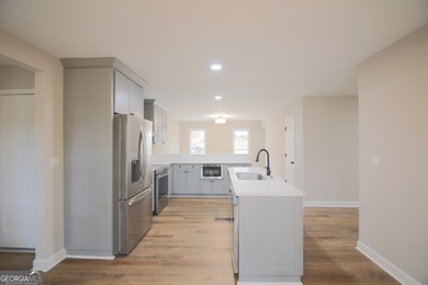 Renovations are complete! This huge home comes complete with a on Brookstone Golf and Country Club in Georgia - for sale on GolfHomes.com, golf home, golf lot