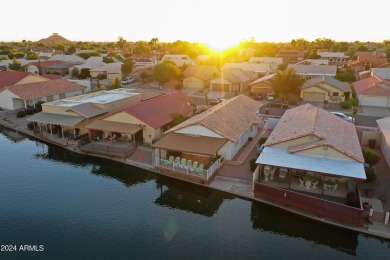 Adorable patio home on Casa Grande Lakes. High ceilings. Bright on Dave White Reg Park and Golf Course in Arizona - for sale on GolfHomes.com, golf home, golf lot