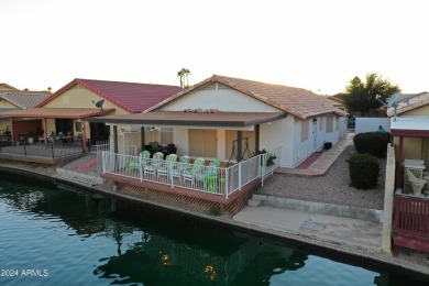 Adorable patio home on Casa Grande Lakes. High ceilings. Bright on Dave White Reg Park and Golf Course in Arizona - for sale on GolfHomes.com, golf home, golf lot