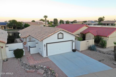 Adorable patio home on Casa Grande Lakes. High ceilings. Bright on Dave White Reg Park and Golf Course in Arizona - for sale on GolfHomes.com, golf home, golf lot