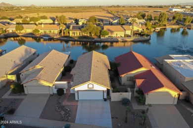 Adorable patio home on Casa Grande Lakes. High ceilings. Bright on Dave White Reg Park and Golf Course in Arizona - for sale on GolfHomes.com, golf home, golf lot