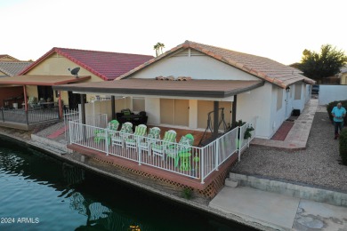 Adorable patio home on Casa Grande Lakes. High ceilings. Bright on Dave White Reg Park and Golf Course in Arizona - for sale on GolfHomes.com, golf home, golf lot