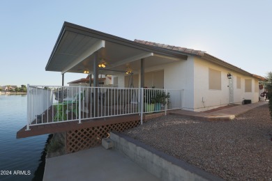 Adorable patio home on Casa Grande Lakes. High ceilings. Bright on Dave White Reg Park and Golf Course in Arizona - for sale on GolfHomes.com, golf home, golf lot