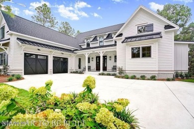 Discover luxury coastal living at 1878 Goose Creek Road on Brick Landing Plantation Yacht and Golf Club in North Carolina - for sale on GolfHomes.com, golf home, golf lot
