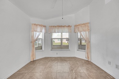Beautiful 2-bedroom, 2-bath CBS block home in the desirable 55+ on Spanish Lakes Fairways in Florida - for sale on GolfHomes.com, golf home, golf lot