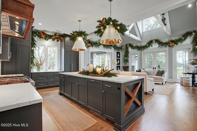 Wake up each morning to sweeping Intracoastal Waterway views on Brick Landing Plantation Yacht and Golf Club in North Carolina - for sale on GolfHomes.com, golf home, golf lot