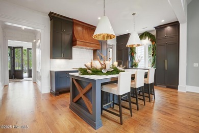 Wake up each morning to sweeping Intracoastal Waterway views on Brick Landing Plantation Yacht and Golf Club in North Carolina - for sale on GolfHomes.com, golf home, golf lot