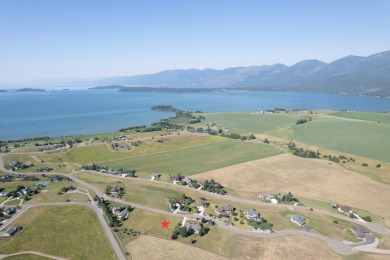 Discover your dream home site on .72 acres with breathtaking on Polson Bay Golf Course - Championship Course in Montana - for sale on GolfHomes.com, golf home, golf lot