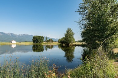 Discover your dream home site on .72 acres with breathtaking on Polson Bay Golf Course - Championship Course in Montana - for sale on GolfHomes.com, golf home, golf lot