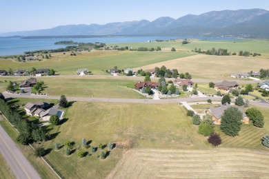 Discover your dream home site on .72 acres with breathtaking on Polson Bay Golf Course - Championship Course in Montana - for sale on GolfHomes.com, golf home, golf lot
