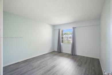 This is THE LOWEST PRICE 2 Bedroom Move in Ready in Century on Flamingo Lakes Country Club in Florida - for sale on GolfHomes.com, golf home, golf lot
