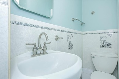 Enter into modern comfort and convenience with this beautifully on South Shore Golf Course in New York - for sale on GolfHomes.com, golf home, golf lot
