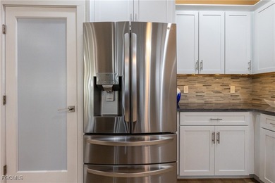 Step into modern luxury with this completely renovated Osprey on Herons Glen Golf and Country Club in Florida - for sale on GolfHomes.com, golf home, golf lot