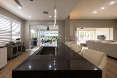 Step into modern luxury with this completely renovated Osprey on Herons Glen Golf and Country Club in Florida - for sale on GolfHomes.com, golf home, golf lot