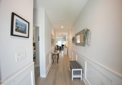 Welcome to your dream home in the highly sought-after community on Ocean Ridge Plantation in North Carolina - for sale on GolfHomes.com, golf home, golf lot
